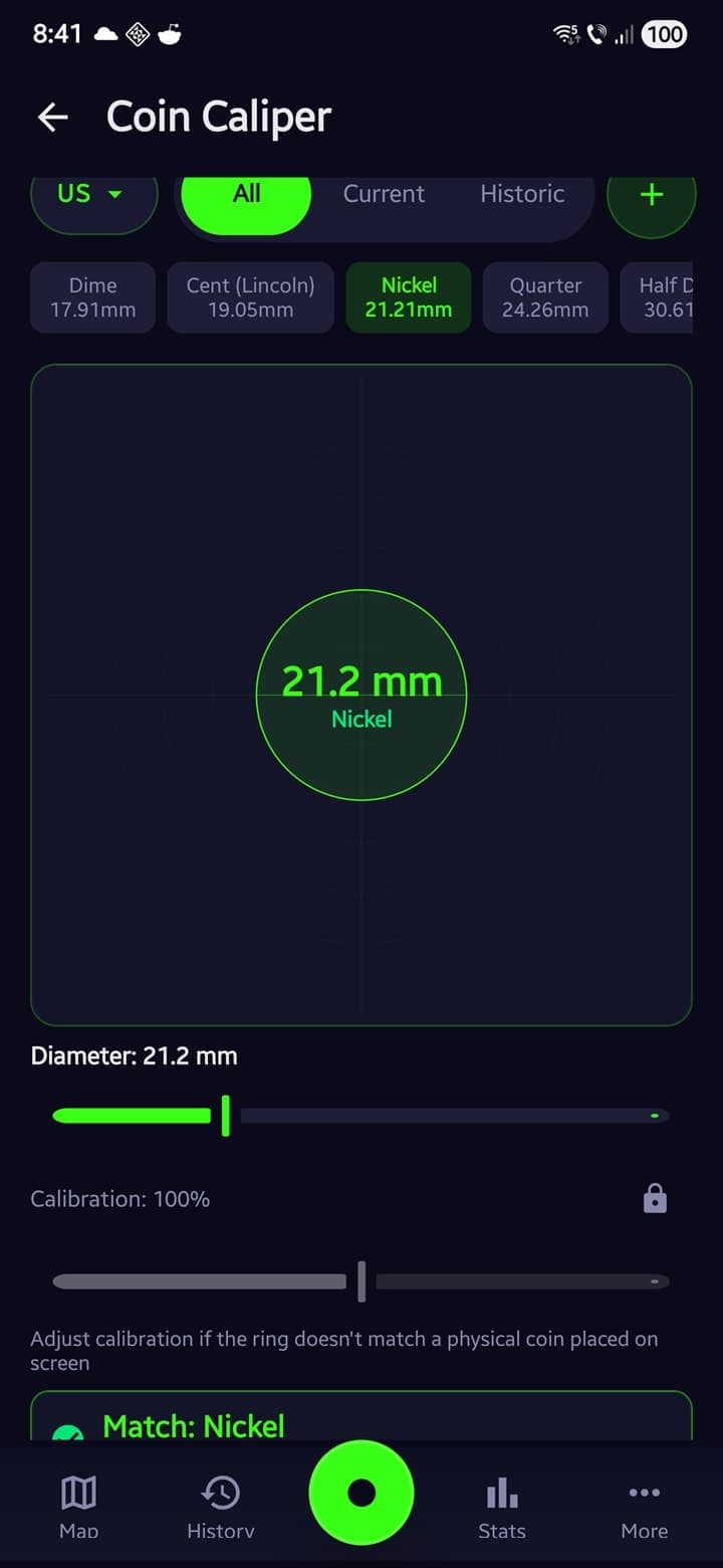 On-screen coin caliper measuring a coin by diameter against a built-in coin database
