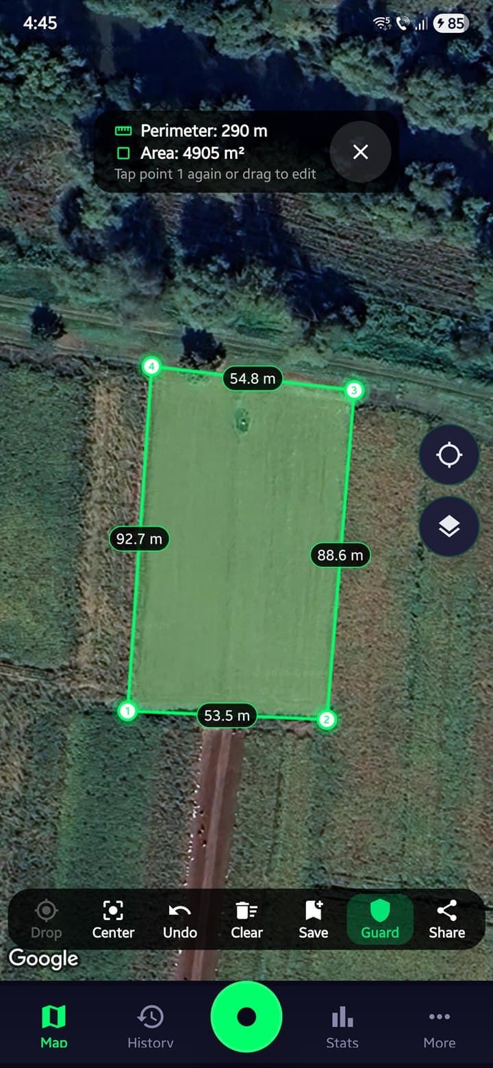 Metal detecting measure tool in area mode showing a closed polygon with perimeter 606 m and area 2.14 ha on a satellite view of a field